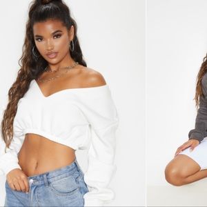 White and grey crop off shoulder sweater